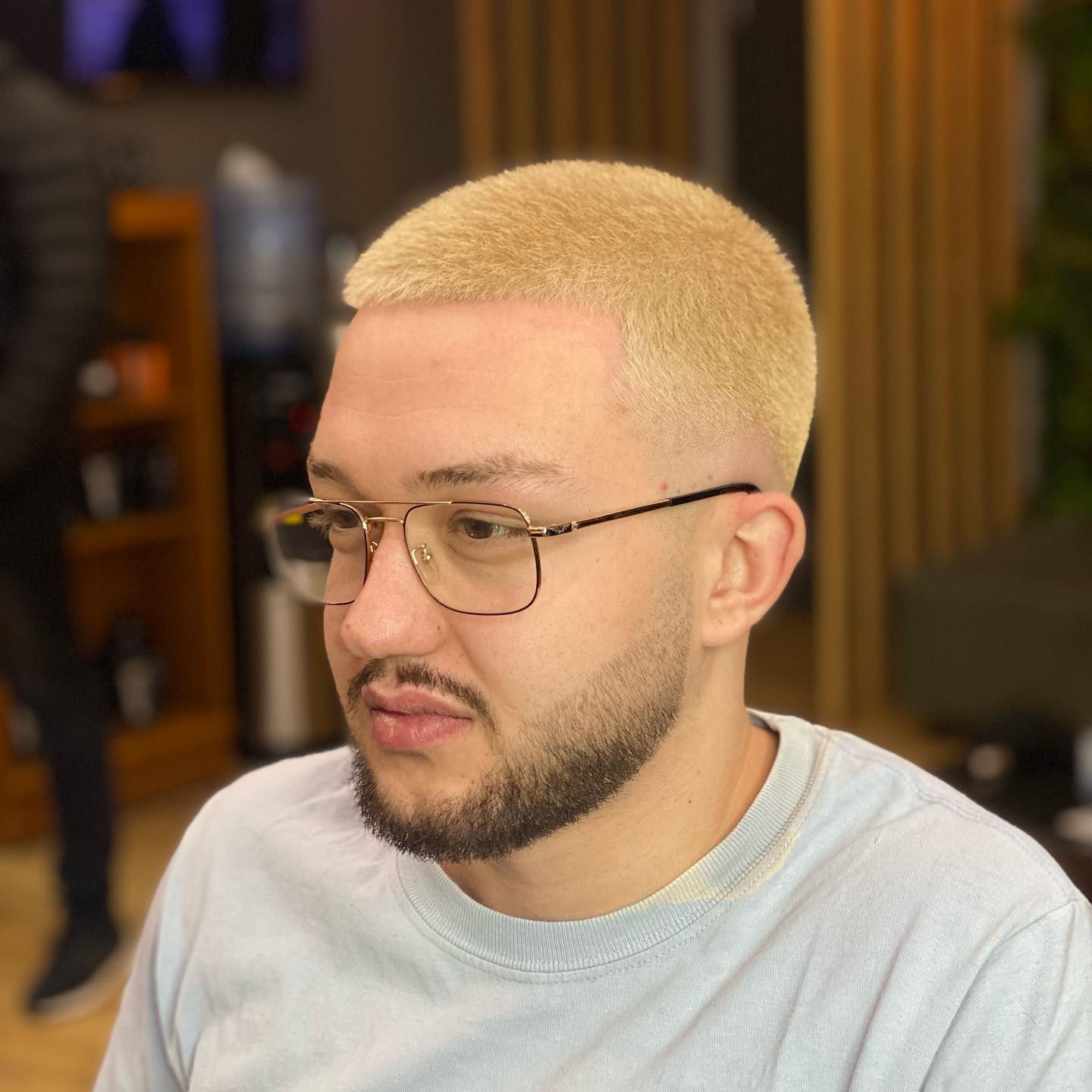Blond buzz cut with a shaped beard